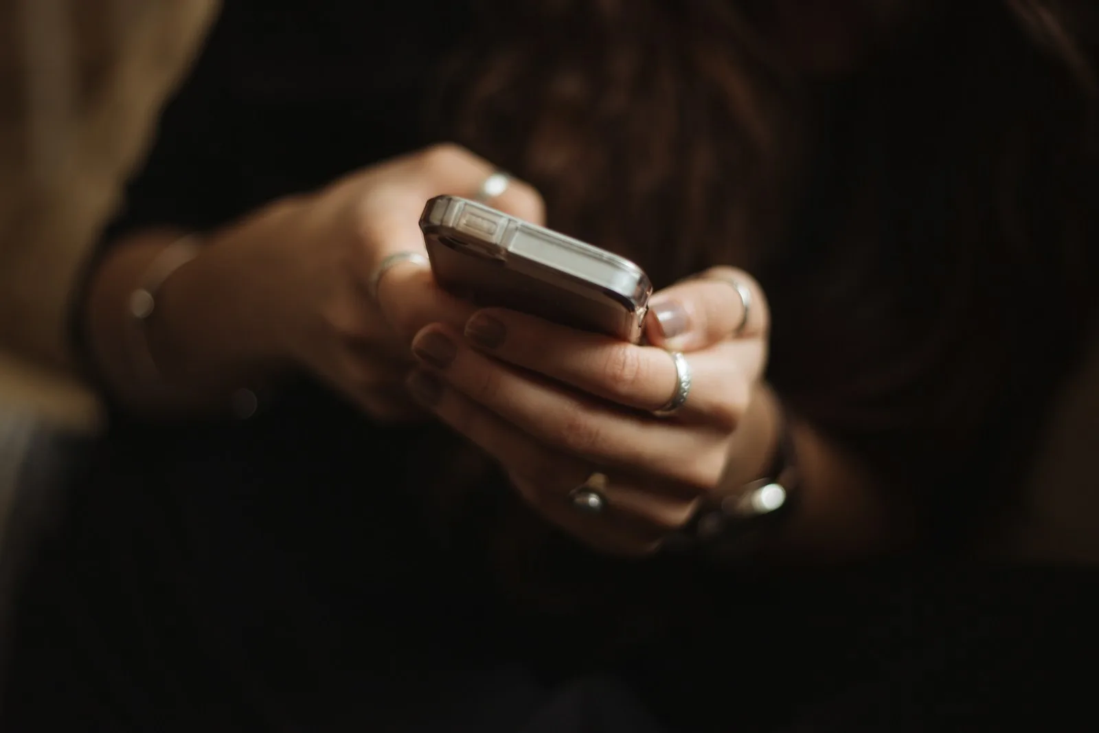 Woman analyzing a conversation on her phone